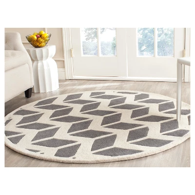 Kenan Solid Tufted Accent Rug - Safavieh 4 Kenan Solid Tufted Accent Rug - Safavieh - Image 2